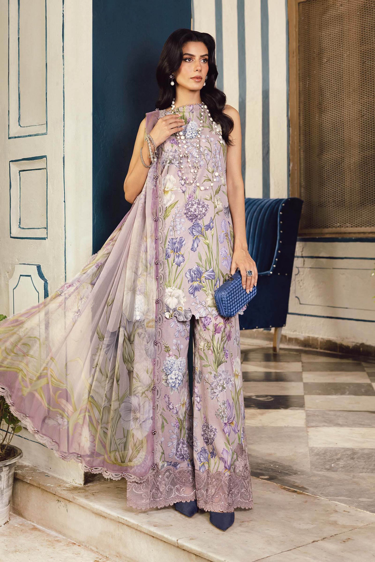 - Maria B MPrint Fall/Winter women's clothing line featuring unstitched suits with wool shawls
