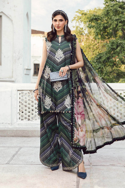 2. 	Model in Maria B MPrint Fall/Winter outfit featuring warm tones and wool shawl