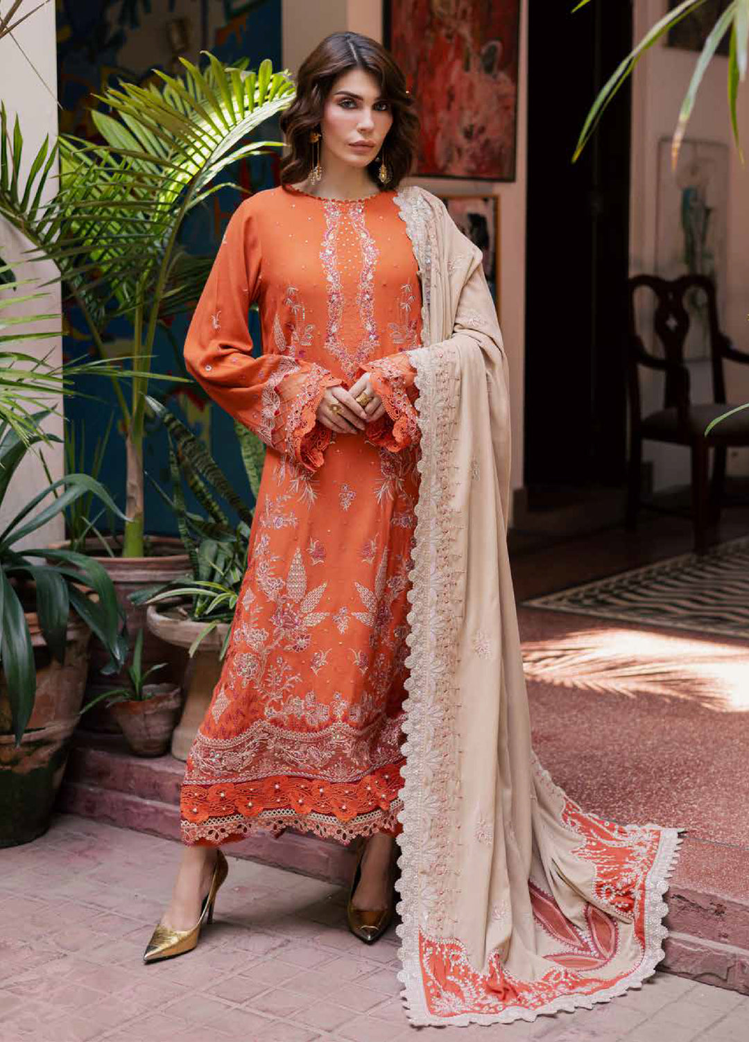 nureh leather peach embroidered winter suit for women  
nureh leather peach unstitched 3-piece suit with velvet shawl  
