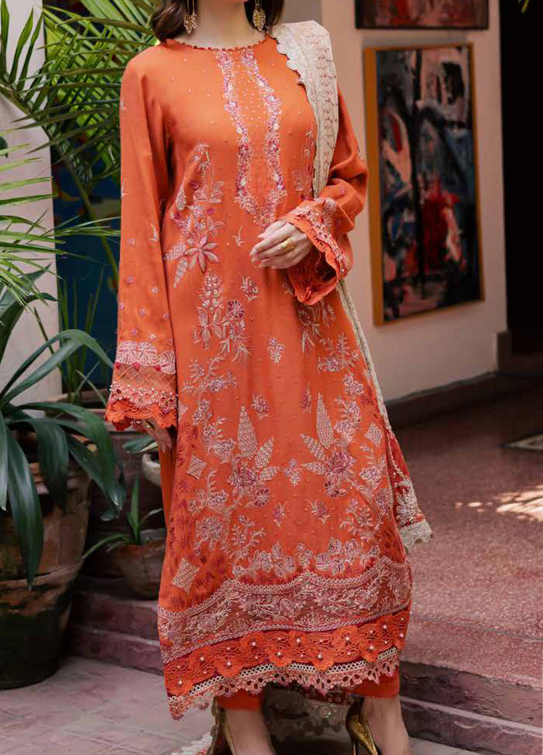 nureh leather peach embroidered winter suit for women  
nureh leather peach unstitched 3-piece suit with velvet shawl  
